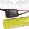 Micro alimentatore 12-24V per microspia GSM - Modulo 5V compatto con cavi e righello per mostrare le dimensioni ridotte.